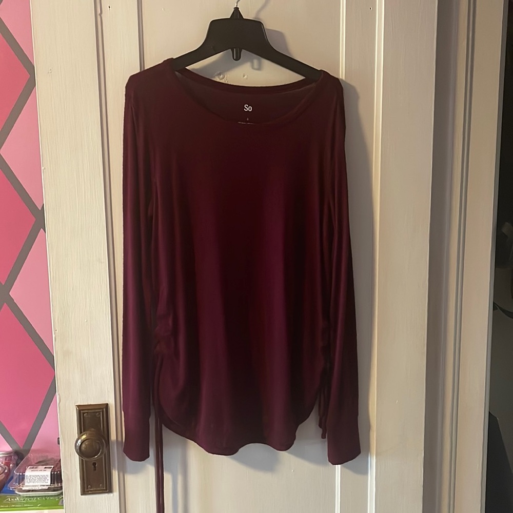 Size small long sleeve with decorative sides